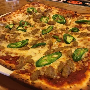 Italian sausage and jalapeño pizza