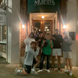 a group of people taking a picture