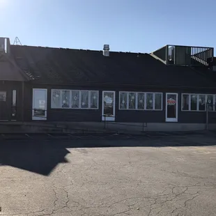 Back of the bar from the parking lot.