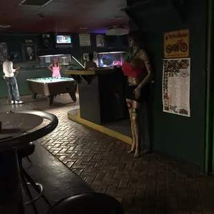 a mannequin in a bar