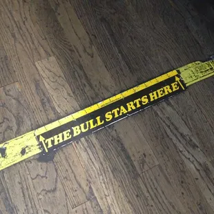 the bull starts here sign