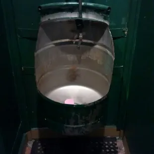 Beer keg urinals.
