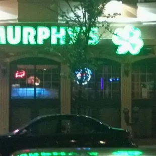 a car parked in front of it