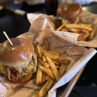 two burgers and french fries