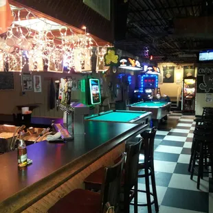 Back room. Full bar, 2 pool tables, 2 dart boards. Plenty of seating.