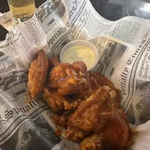 Hot and Lemon Pepper wings mixed with a cold beer.
