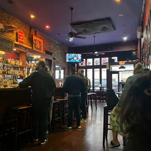 people sitting at the bar