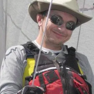 Iain T.
