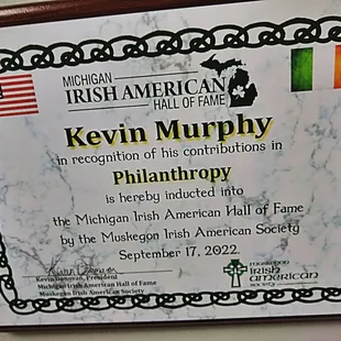 a plaque with the name of the restaurant