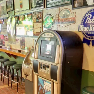 Juke box, cash machine, beer signs