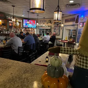 customers sitting at the bar