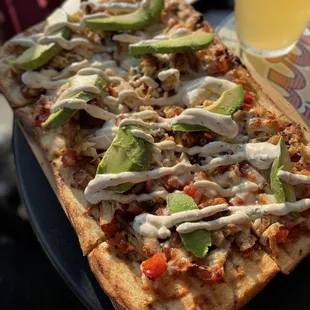 Grilled chicken and avocados flatbread