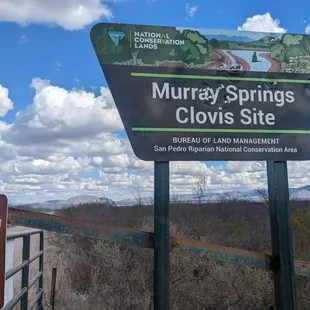 Signs at the cattle guard gate off Moon Toad