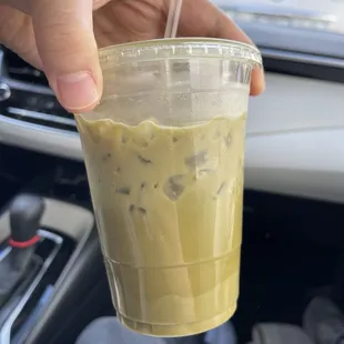 Iced Chaga Matcha w/ oat milk and strawberry syrup