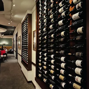 a wall of wine bottles