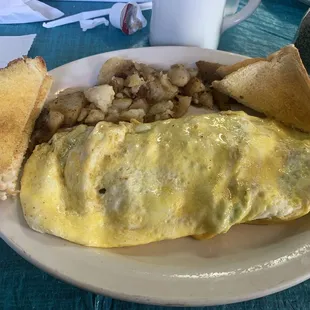 Western omelette and fried potatoes.