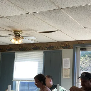 Ceiling tiles need to be replaced, they are dropping debris over people&apos;s tables.