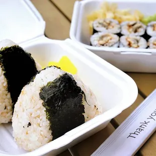 Salmon Onigiri: 2 pieces of rice balls with cooked salmon ($4.10).