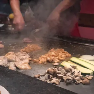 Chef Manny putting his skills to work