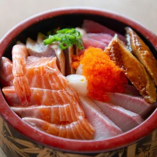 a bowl of sashimi