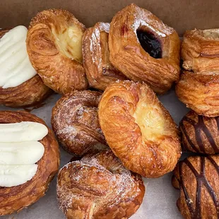 a variety of pastries in a box