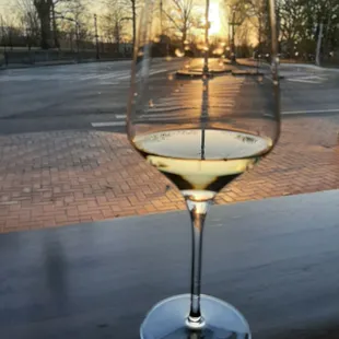 a glass of wine on a table