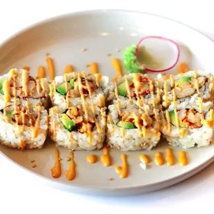 crawfish roll- NORI- seasoned crawfish tails - avocado - spicy mayo - sesame seeds.