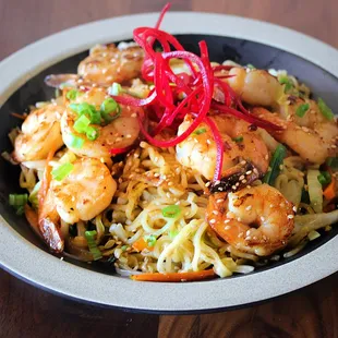 yakisoba noods- Japanese style thin noodles and mixed vegetables wok stir-fry with house sauce and choice of protein.