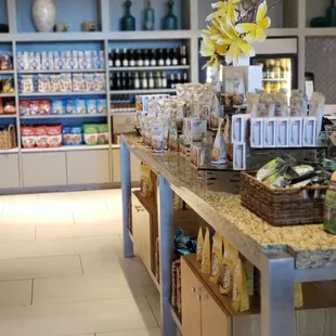 a grocery store with a variety of items on the counter