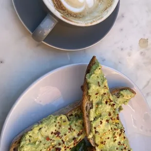 Avocado toast and cappuccino