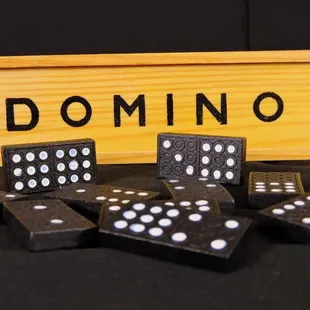 domino game pieces and a wooden box