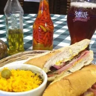 a plate of food and a glass of beer