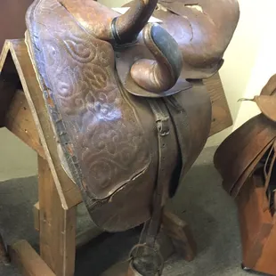 Side saddle. I'd like to see a photo to show how a lady mounted and rode with these for visitors to understand.