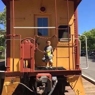 At the back of the caboose