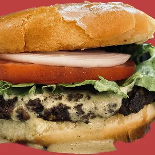 Crabless cake sandwich with tomato, onion, lettuce, and remoulade