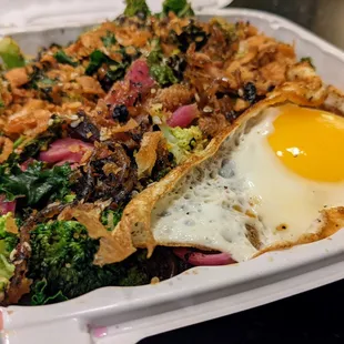 My Classic Bowl. Kale and broccoli, glass noodles, Manilla chicken adobo, lemongrass BBQ pork, fried egg. $16.