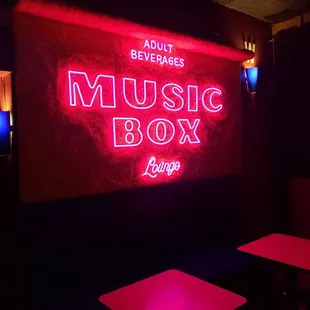 a neon sign in the dark