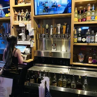 a woman at the bar