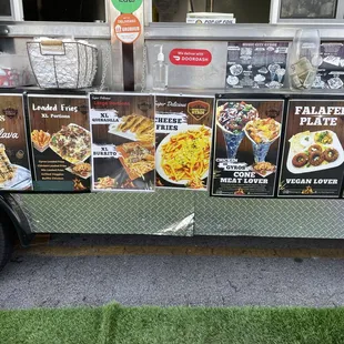 a food truck with menus