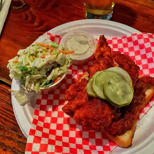 Nashville Hot Tenders, Side of Coleslaw and Ranch. Comes with white bread and pickles.