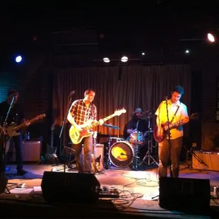 a group of musicians on stage