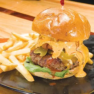 Looking for a place to enjoy pizza, chicken wings and a cold brew, while watching sports on TV?...