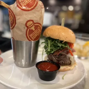 The Italian Job burger, seated at the bar