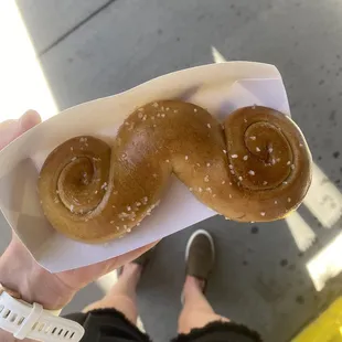 a person holding a paper plate