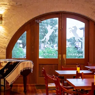a man sitting at a table in a restaurant