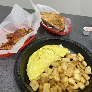 Spinach, mushroom, feta omelette, bacon, home fries &amp; toast.