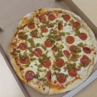 Pepperoni and green chili pizza