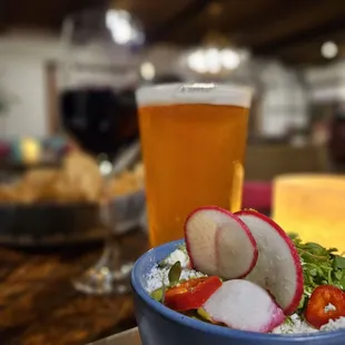 Guacamole fresh tortilla chips. Glass of Melbec, &amp; IPA beer