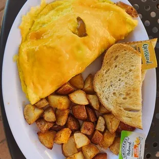 build you n own omlete with sausage and bacon. seasoned red potatoes and sourdough toast.