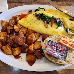 Spinach &amp;cheese omelet with potatoes &amp; English muffin
